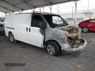 2006 GMC Savana Cargo Van with VIN 1GTFG15X961128838, listed as a IAAI auction lot 41521596 with 1 mi miles. Bid and sale history available at carsss.com. Image 1.