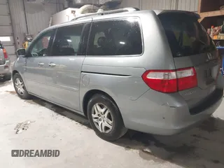 2007 Honda Odyssey EX-L with VIN 5FNRL38697B012944, listed as a IAAI auction lot 42144250 with 234,016 mi miles and . Bid and sale history available at DreamBid. Image 3.