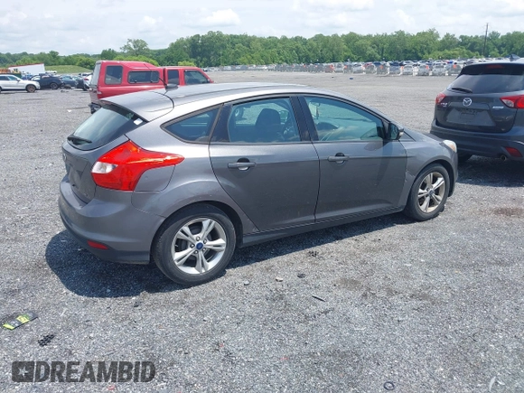 2014 Ford Focus SE z VIN 1FADP3K20EL188088, wystawiony jako IAAI lot #42455783 z przebiegiem 201 105 mil mil oraz . Historia ofert i sprzedaży dostępna na DreamBid. Obrazek 4.