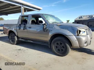 2004 Nissan Frontier XE z VIN 1N6ED27T94C461253, wystawiony jako Copart lot #86311014 z przebiegiem 174 836 mil mil oraz Szkoda całkowita • Salvage title. Historia ofert i sprzedaży dostępna na DreamBid. Obrazek 4.