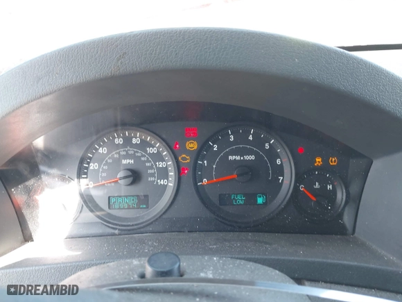 2005 Jeep Grand Cherokee Laredo with VIN 1J4GR48K55C651268, listed as a IAAI auction lot 41987117 with 189,974 mi miles. Bid and sale history available at carsss.com. Image 7.