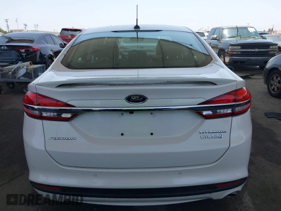 2017 Ford Fusion Hybrid Titanium with VIN 3FA6P0RU8HR229653, listed as a IAAI auction lot 42445182 with 163,279 mi miles and . Bid and sale history available at DreamBid. Image 16.