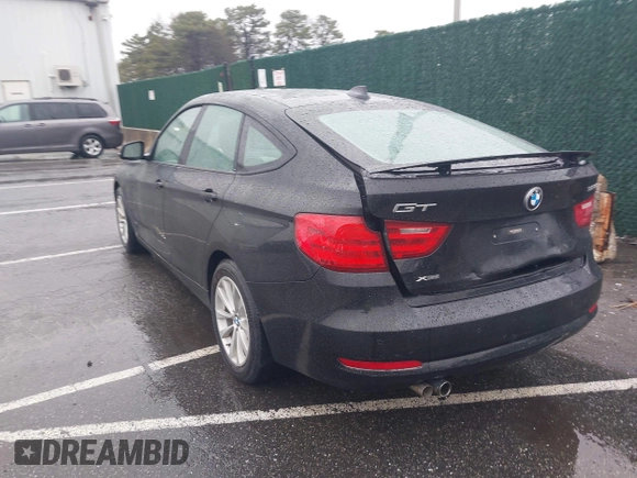 2014 BMW 3 Series 328i Gran Turismo xDrive z VIN WBA3X5C56ED556632, wystawiony jako IAAI lot #41962313 z przebiegiem 99 512 mil mil oraz . Historia ofert i sprzedaży dostępna na DreamBid. Obrazek 3.