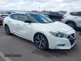 2016 Nissan Maxima SL z VIN 1N4AA6AP6GC389404, wystawiony jako IAAI lot #41949282 z przebiegiem 154 554 mil mil oraz . Historia ofert i sprzedaży dostępna na DreamBid. Obrazek 1.
