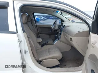 2007 Dodge Caliber SXT z VIN 1B3HB48B77D185971, wystawiony jako IAAI lot #41615355 z przebiegiem 165 367 mil mil oraz . Historia ofert i sprzedaży dostępna na DreamBid. Obrazek 5.