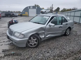 1999 Mercedes-Benz C 230/260/280/320 with VIN WDBHA24G1XA756393, listed as a Copart auction lot 80227694 with 123,520 mi miles and Salvage Title. Bid and sale history available at carsss.com. Image 1.