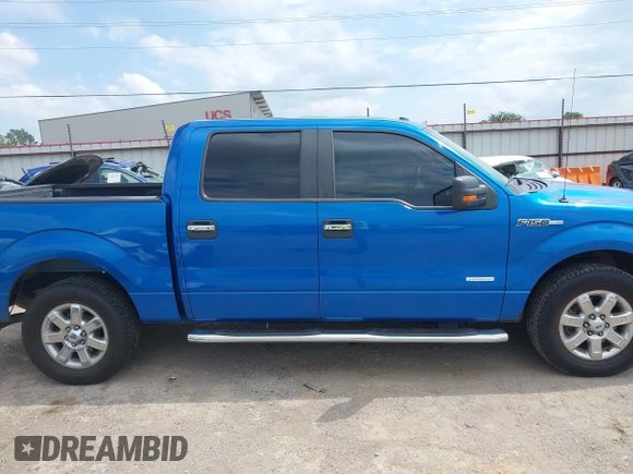 2014 Ford F-150 XL with VIN 1FTFW1CT6EKF05542, listed as a IAAI auction lot 42335272 with 169,985 mi miles and . Bid and sale history available at DreamBid. Image 13.