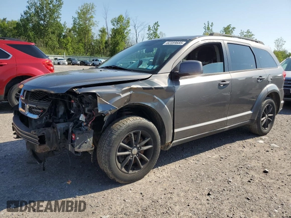 2013 Dodge Journey SXT with VIN 3C4PDCBGXDT630423, listed as a Copart auction lot 62359685 with 151,653 mi miles and Salvage title. Bid and sale history available at DreamBid. Image 1.