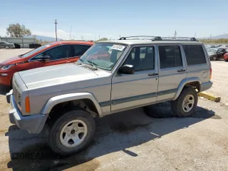 2000 Jeep Cherokee with VIN 1J4FF48S6YL136689, listed as a Copart auction lot 62316245 with 211,100 mi miles and Clean title. Bid and sale history available at DreamBid. Image 1.