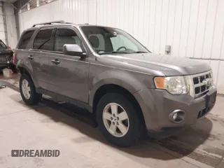 2012 Ford Escape XLT with VIN 1FMCU0D71CKA90823, listed as a IAAI auction lot 41764650 with 65,994 mi miles. Bid and sale history available at carsss.com. Image 1.