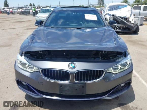 2015 BMW 4 Series 428i with VIN WBA4A5C59FG052596, listed as a IAAI auction lot 42649927 with 68,842 mi miles and . Bid and sale history available at DreamBid. Image 12.