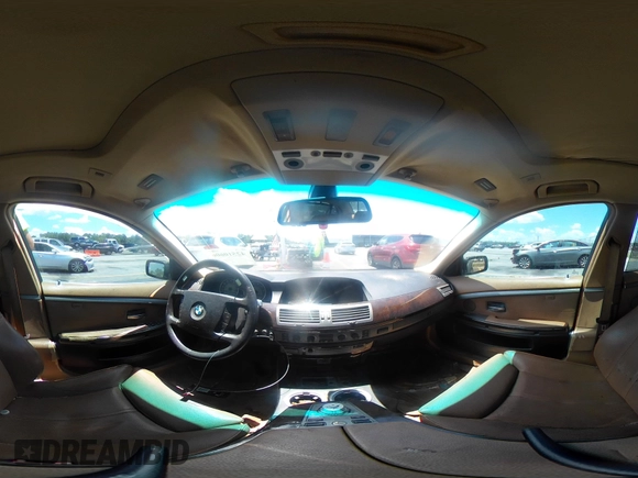 2005 BMW 7 Series 745Li with VIN WBAGN63545DS59212, listed as a IAAI auction lot 42510606 with 124,395 mi miles and . Bid and sale history available at DreamBid. Image 23.