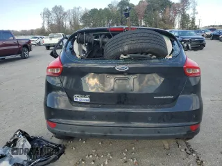 2017 Ford Focus Titanium z VIN 1FADP3N23HL291408, wystawiony jako Copart lot #83876124 z przebiegiem Nie podano mil oraz Szkoda całkowita • Salvage title. Historia ofert i sprzedaży dostępna na DreamBid. Obrazek 6.