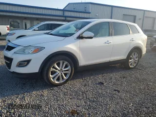 2011 Mazda CX-9 Grand Touring z VIN JM3TB3DV2B0311423, wystawiony jako Copart lot #52713805 z przebiegiem 169 000 mil mil oraz Szkoda całkowita • Salvage title. Historia ofert i sprzedaży dostępna na DreamBid. Obrazek 1.