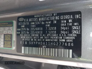 2017 Kia Sorento EX with VIN 5XYPHDA11HG277686, listed as a IAAI auction lot 41790097 with 70,799 mi miles and . Bid and sale history available at carsss.com. Image 9.