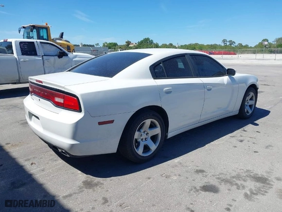 2013 Dodge Charger Police with VIN 2C3CDXAT0DH696299, listed as a IAAI auction lot 41734160 with 108,245 mi miles. Bid and sale history available at carsss.com. Image 4.