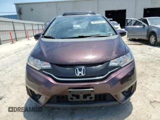 2015 Honda Fit EX z VIN 3HGGK5G82FM745065, wystawiony jako Copart lot #58358525 z przebiegiem 104 769 mil mil oraz Szkoda całkowita • Salvage title. Historia ofert i sprzedaży dostępna na DreamBid. Obrazek 5.