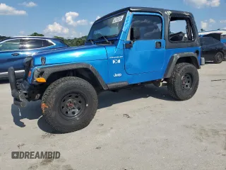2002 Jeep Wrangler X with VIN 1J4FA39S92P776435, listed as a Copart auction lot 62792235 with 182,385 mi miles and Salvage title. Bid and sale history available at DreamBid. Image 1.
