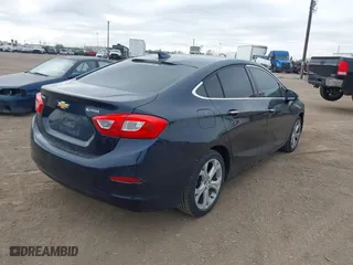 2016 Chevrolet Cruze Premier with VIN 1G1BG5SM1G7250939, listed as a IAAI auction lot 41238704 with 127,872 mi miles. Bid and sale history available at carsss.com. Image 4.