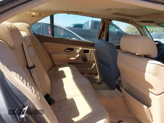 2001 BMW 7 Series 740iL with VIN WBAGH83421DP25417, listed as a IAAI auction lot 41725971 with 165,599 mi miles. Bid and sale history available at carsss.com. Image 8.