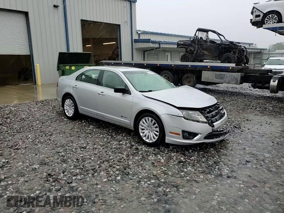 2010 Ford Fusion Hybrid with VIN 3FADP0L32AR142750, listed as a Copart auction lot 62395305 with 144,384 mi miles and Salvage title. Bid and sale history available at DreamBid. Image 13.