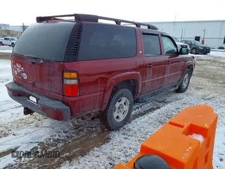 2005 Chevrolet Suburban Z71 with VIN 3GNFK16Z55G210040, listed as a IAAI auction lot 41431533 with 195,819 mi miles. Bid and sale history available at carsss.com. Image 4.