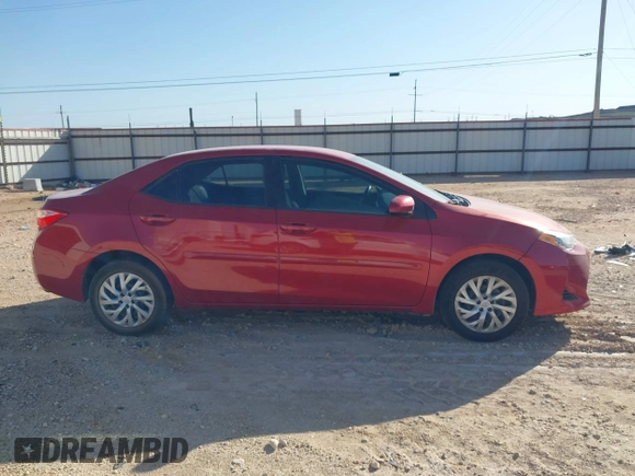 2018 Toyota Corolla L z VIN 5YFBURHE9JP790181, wystawiony jako IAAI lot #41982399 z przebiegiem 79 536 mil mil oraz . Historia ofert i sprzedaży dostępna na DreamBid. Obrazek 13.