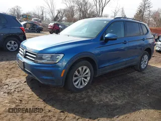 2018 Volkswagen Tiguan S with VIN 3VV1B7AX6JM108786, listed as a IAAI auction lot 41708099 with 162,289 mi miles and . Bid and sale history available at DreamBid. Image 21.