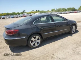 2013 Volkswagen CC R-Line z VIN WVWBN7AN3DE512289, wystawiony jako Copart lot #51865735 z przebiegiem 69 799 mil mil oraz Szkoda całkowita • Salvage title. Historia ofert i sprzedaży dostępna na DreamBid. Obrazek 3.