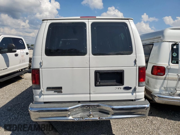2009 Ford Econoline Passenger XL with VIN 1FBSS31L99DA06824, listed as a Copart auction lot 73740824 with 147,528 mi miles and Salvage title. Bid and sale history available at DreamBid. Image 6.