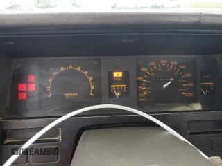 1986 Nissan Hardbody E z VIN JN6ND11S7GW014787, wystawiony jako Copart lot #45291425 z przebiegiem 171 557 mil mil oraz Szkody całkowita. Historia ofert i sprzedaży dostępna na DreamBid. Obrazek 9.
