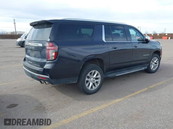 2022 Chevrolet Suburban Premier with VIN 1GNSKFKD5NR293216, listed as a IAAI auction lot 41778432 with 76,471 mi miles. Bid and sale history available at carsss.com. Image 4.