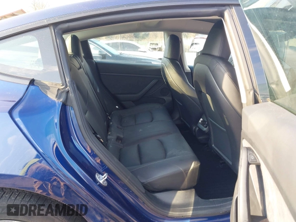 2023 Tesla Model 3 with VIN 5YJ3E1EA1PF655558, listed as a IAAI auction lot 41668827 with 68,778 mi miles and . Bid and sale history available at carsss.com. Image 8.
