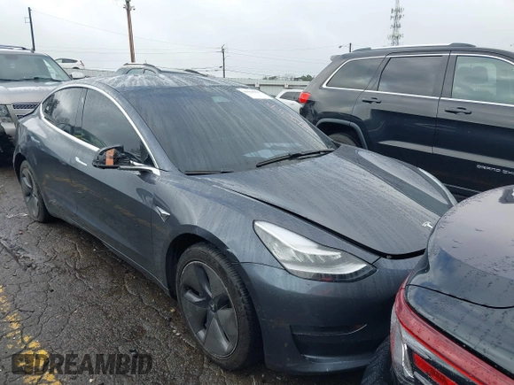 2019 Tesla Model 3 Mid Range with VIN 5YJ3E1EA3KF426971, listed as a IAAI auction lot 41564939 with Not Provided miles and . Bid and sale history available at carsss.com. Image 1.