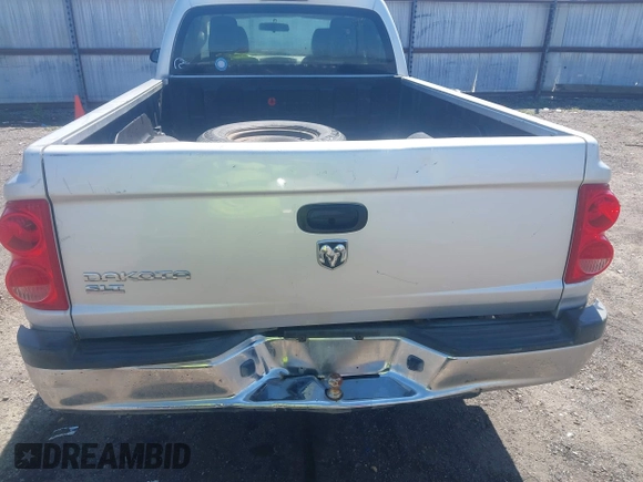 2005 Dodge Dakota SLT with VIN 1D7HE42K95S337682, listed as a IAAI auction lot 41905755 with 145,095 mi miles and . Bid and sale history available at carsss.com. Image 12.