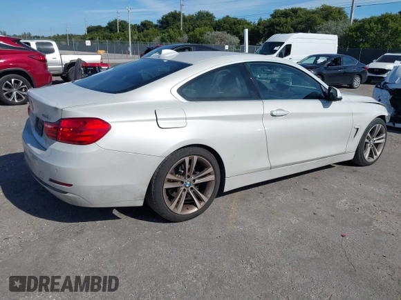 2016 BMW 4 Series 428i with VIN WBA3N7C57GK227468, listed as a IAAI auction lot 41188647 with 81,115 mi miles and . Bid and sale history available at carsss.com. Image 4.