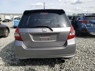 2007 Honda Fit Sport z VIN JHMGD37677S001013, wystawiony jako Copart lot #58792605 z przebiegiem 157 960 mil mil oraz Czysty tytuł • Clean title. Historia ofert i sprzedaży dostępna na DreamBid. Obrazek 6.