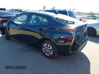 2017 Toyota Prius Two with VIN JTDKARFU1H3039405, listed as a IAAI auction lot 41834929 with 133,948 mi miles and . Bid and sale history available at DreamBid. Image 3.