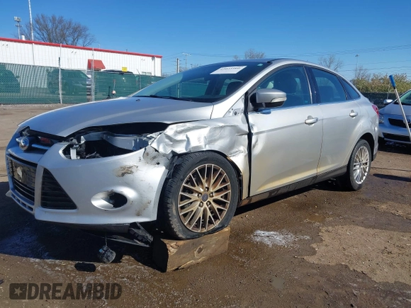 2014 Ford Focus Titanium with VIN 1FADP3J28EL354505, listed as a IAAI auction lot 42025966 with 104,868 mi miles. Bid and sale history available at carsss.com. Image 6.