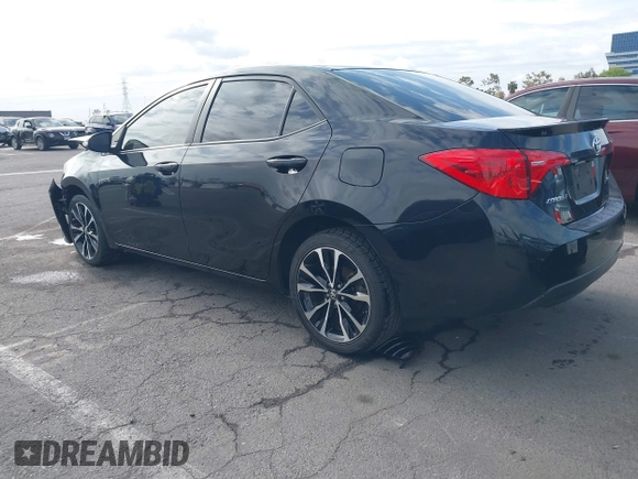 2019 Toyota Corolla L with VIN 5YFBURHE6KP892992, listed as a IAAI auction lot 42057187 with 80,304 mi miles and . Bid and sale history available at DreamBid. Image 3.