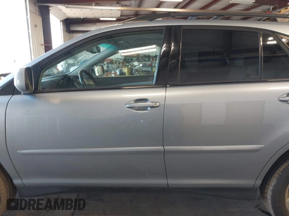 2005 Lexus RX 330 with VIN JTJGA31U450049690, listed as a IAAI auction lot 42100979 with 150,475 mi miles and . Bid and sale history available at DreamBid. Image 14.