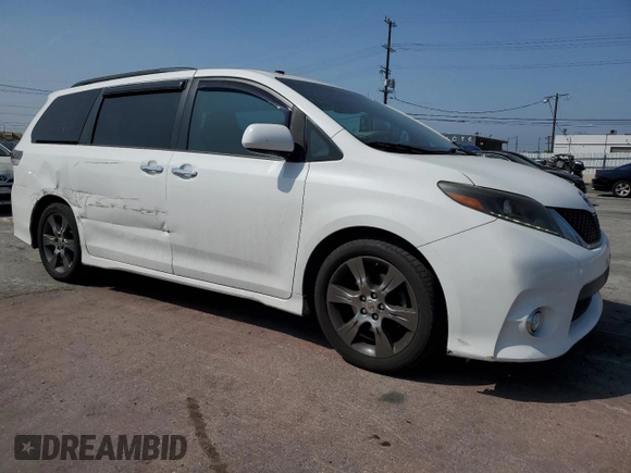 2015 Toyota Sienna SE with VIN 5TDXK3DC7FS601720, listed as a Copart auction lot 59959325 with 262,419 mi miles and Salvage title. Bid and sale history available at DreamBid. Image 4.