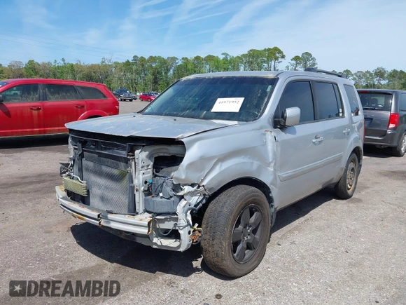 2011 Honda Pilot EX-L with VIN 5FNYF4H60BB096041, listed as a IAAI auction lot 41971952 with 165,868 mi miles and . Bid and sale history available at carsss.com. Image 17.
