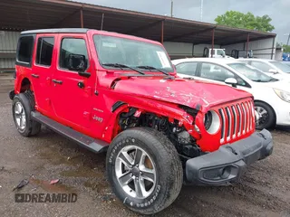 2021 Jeep Wrangler Unlimited Sahara z VIN 1C4HJXENXMW592247, wystawiony jako IAAI lot #42400789 z przebiegiem 71 751 mil mil oraz . Historia ofert i sprzedaży dostępna na DreamBid. Obrazek 1.
