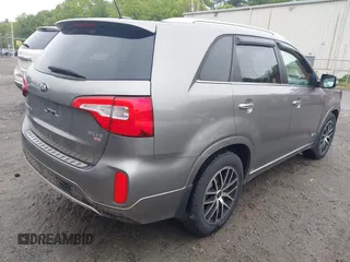 2014 Kia Sorento SX z VIN 5XYKWDA70EG478463, wystawiony jako IAAI lot #42251435 z przebiegiem 102 638 mil mil oraz . Historia ofert i sprzedaży dostępna na DreamBid. Obrazek 4.