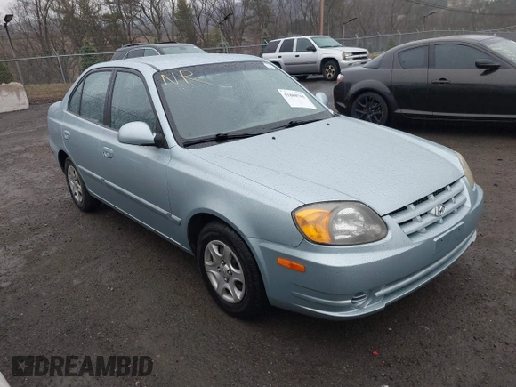 2003 Hyundai Accent GL with VIN KMHCG45C33U473080, listed as a IAAI auction lot 41868765 with 57,478 mi miles. Bid and sale history available at carsss.com. Image 1.
