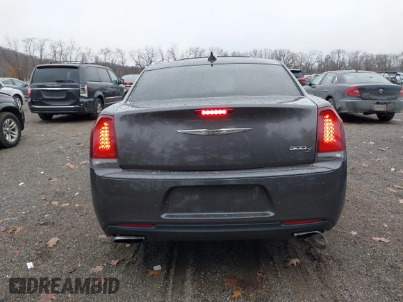 2016 Chrysler 300 S with VIN 2C3CCABG9GH230229, listed as a IAAI auction lot 40937329 with 147,808 mi miles and . Bid and sale history available at DreamBid. Image 17.