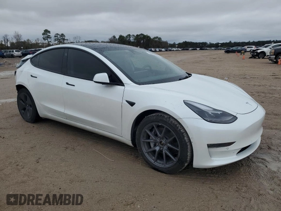 2022 Tesla Model 3 Long Range with VIN 5YJ3E1EB2NF201275, listed as a Copart auction lot 88024985 with 43,540 mi miles and Salvage Title. Bid and sale history available at DreamBid. Image 4.