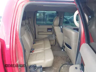 2005 Ford F-150 XLT with VIN 1FTPW12585KE04249, listed as a IAAI auction lot 41983950 with 212,289 mi miles. Bid and sale history available at carsss.com. Image 8.