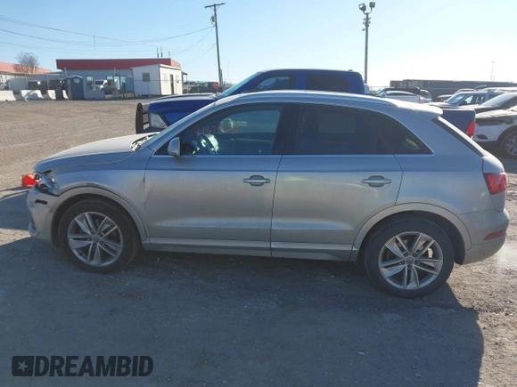 2017 Audi Q3 Premium Plus z VIN WA1JCCFS5HR011907, wystawiony jako IAAI lot #41675496 z przebiegiem 102 591 mil mil oraz . Historia ofert i sprzedaży dostępna na DreamBid. Obrazek 14.